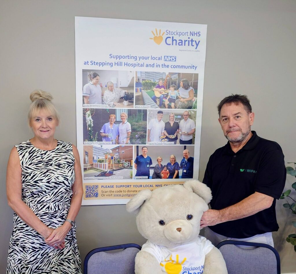 Fundraisers Mandy and Mark Saxon with the Stockport NHS Charity bear