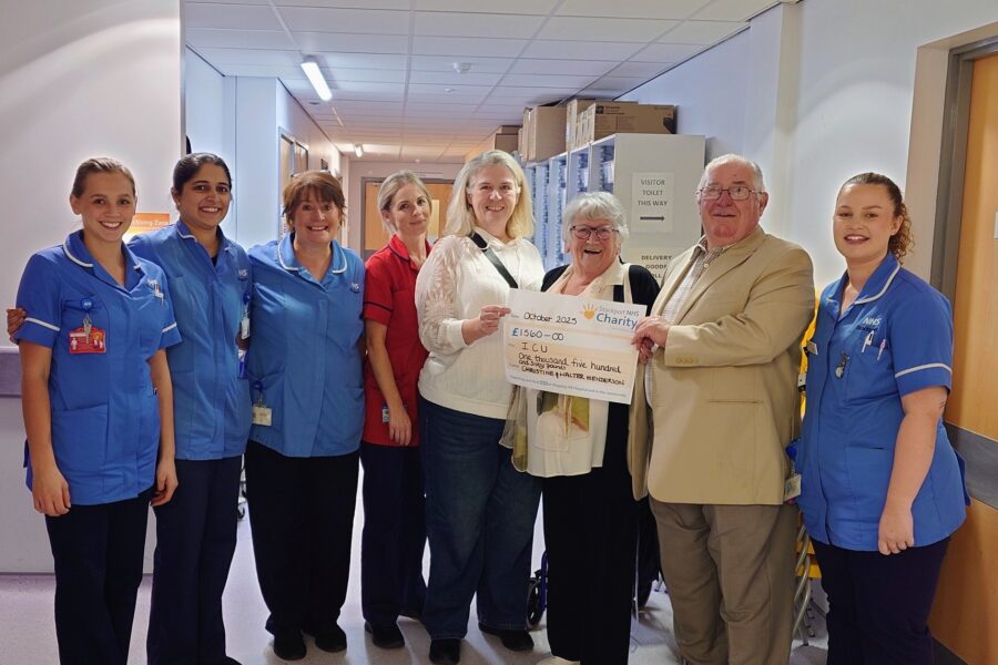 ICU team receiving cheque gift