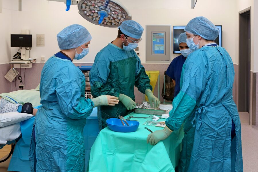 Surgical team carrying our surgery