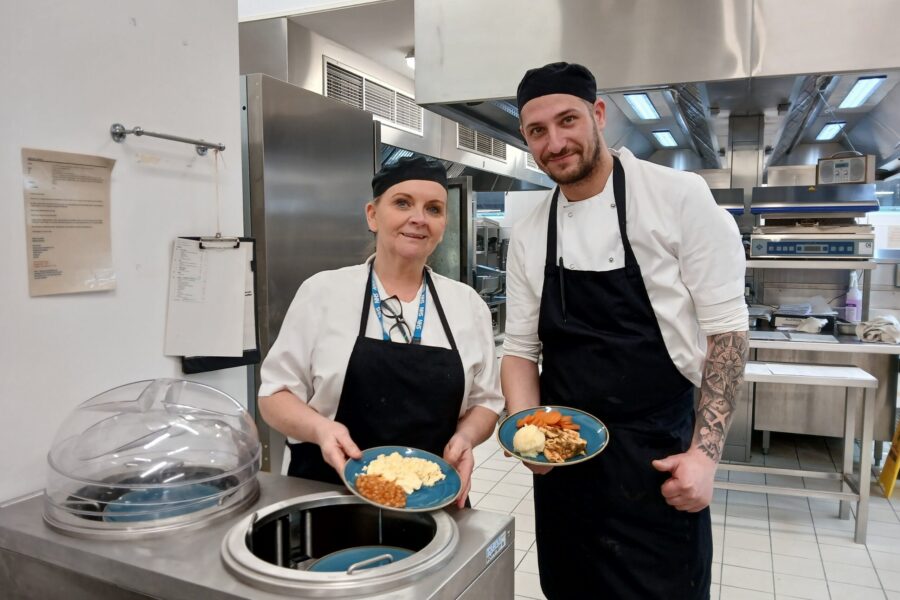 Catering staff showing blue plates