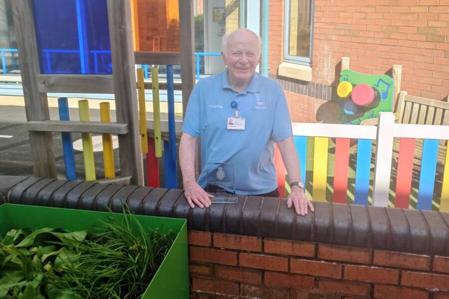 Volunteer Skip Hamilton in the Treehouse children's unit garden