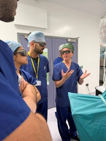 Surgical staff talking during HoLEP urology training day