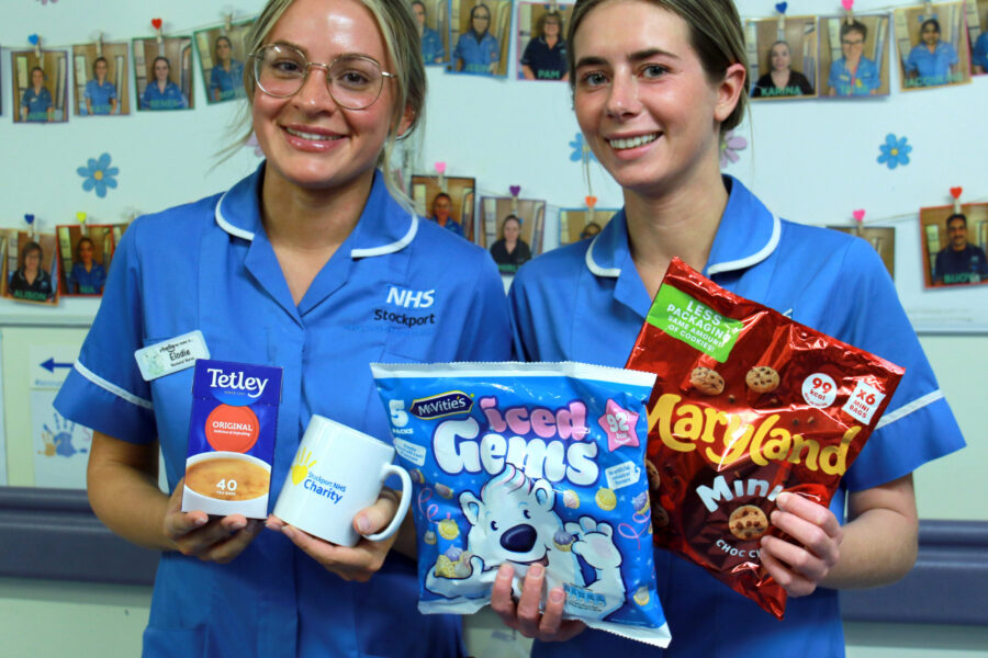 Nurses with tea cups and sweet treats