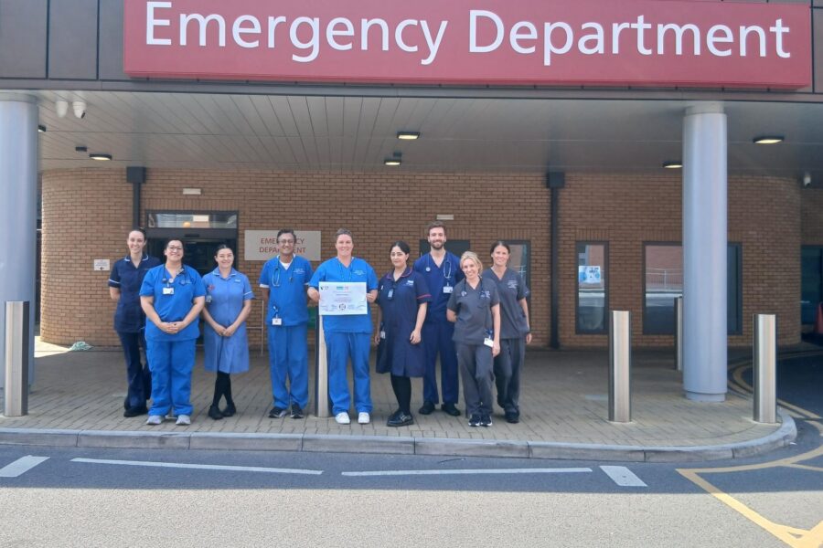 Emergency Department colleagues with Bronze GreenED award certifcate