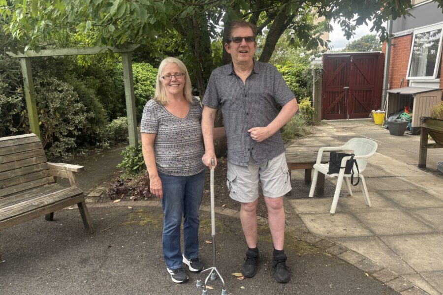 Andy Shaw in stroke unit garden with wife Bernadette