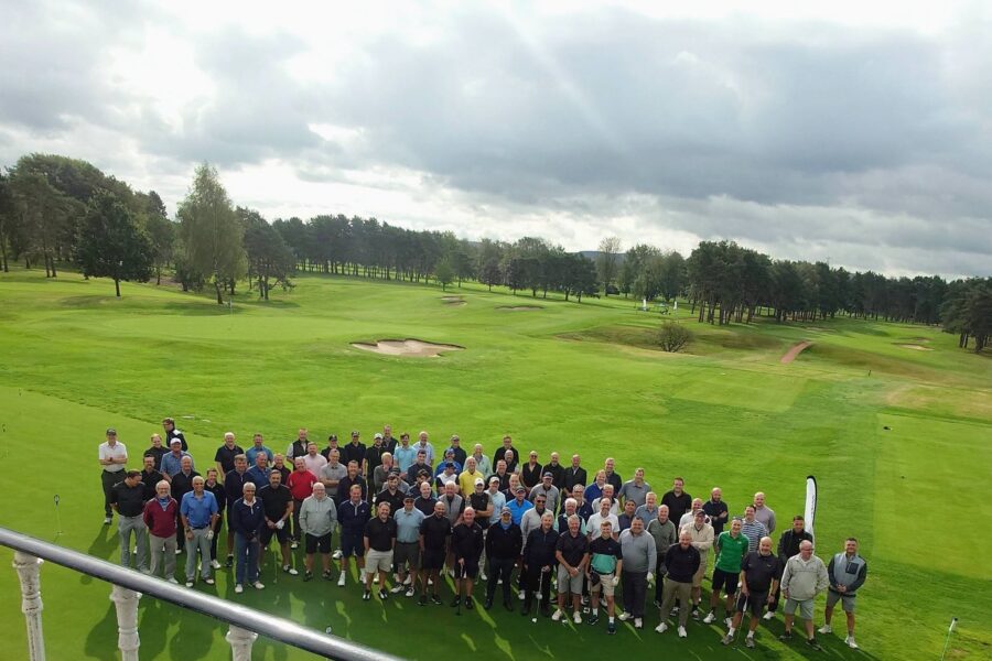 Golfers assemble on the course on the fundraising day